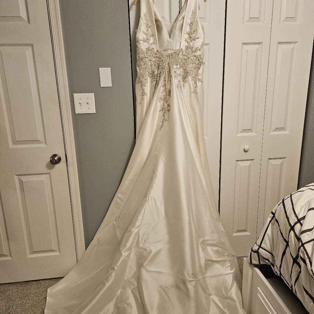 Sottero and Midgley fit and flare wedding dress